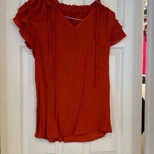 Burnt orange blouse